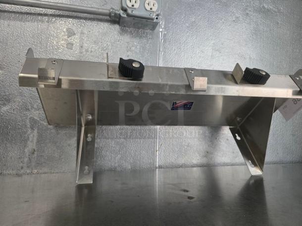 John Boos stainless steel wall shelf, industrial-grade, features adjustable brackets, label visible, excellent condition.