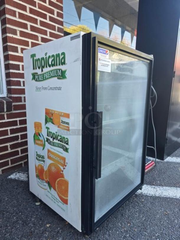 True GDM-07 countertop glass door refrigerated merchandiser, Tropicana graphics, single section, used condition.