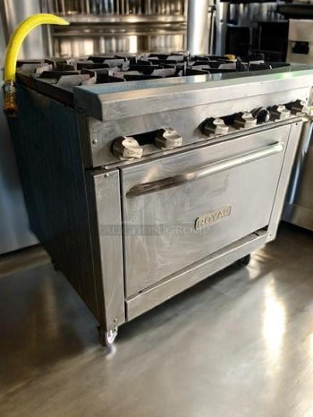 Royal Range RR-6 gas range with six burners and standard oven. Excellent condition, natural gas, fully tested, heavy-duty model.