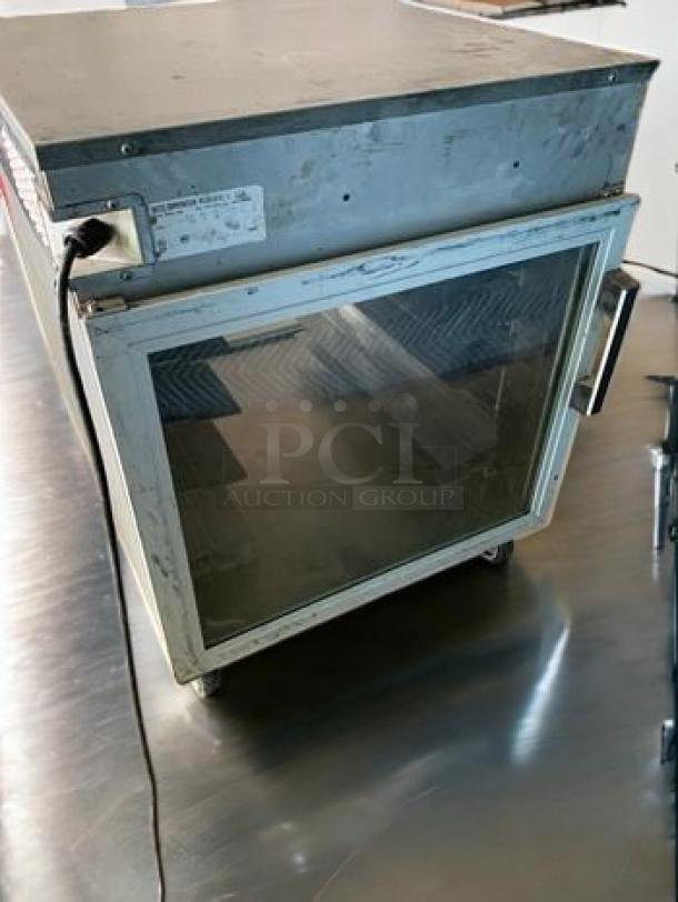 Hatco FSHC-6W2 heated holding cabinet in superb condition, 120V. Pass-through design, portable with visible control panel.