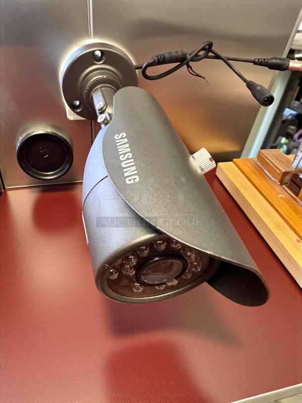 Samsung outdoor bullet camera, superb condition, infrared night vision, 12V DC, fully tested, includes wall mount.