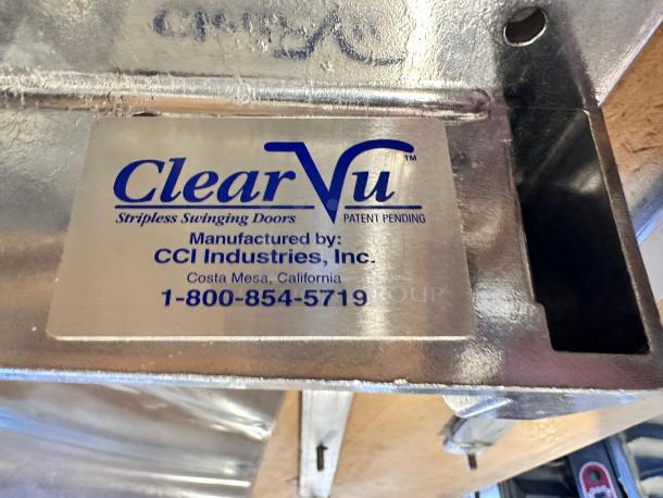 ClearVu Stripless Swinging Door Assembly by CCI Industries. Features heavy-duty aluminum hinges and mounting kit. Patent pending.