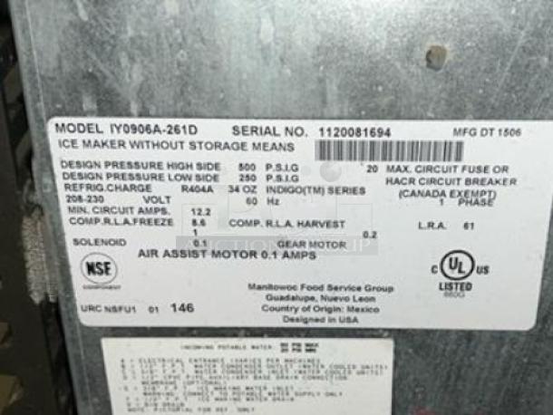 Label on Manitowoc IY0906A-261D, air-cooled ice maker head, showing model, serial number, specs, and electrical details.