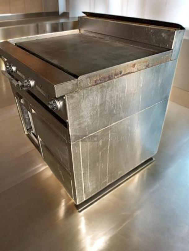 Immaculate Jade Range JTRH-24-Titan 24" gas griddle with refrigerated base, 120V, stainless steel, fully tested and working.