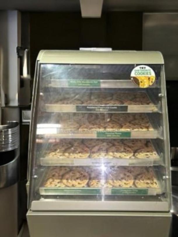 Commercial Food Display 4-Tier Bakery Merchandiser, superb condition, countertop design. Holds cookies, fully tested and working.