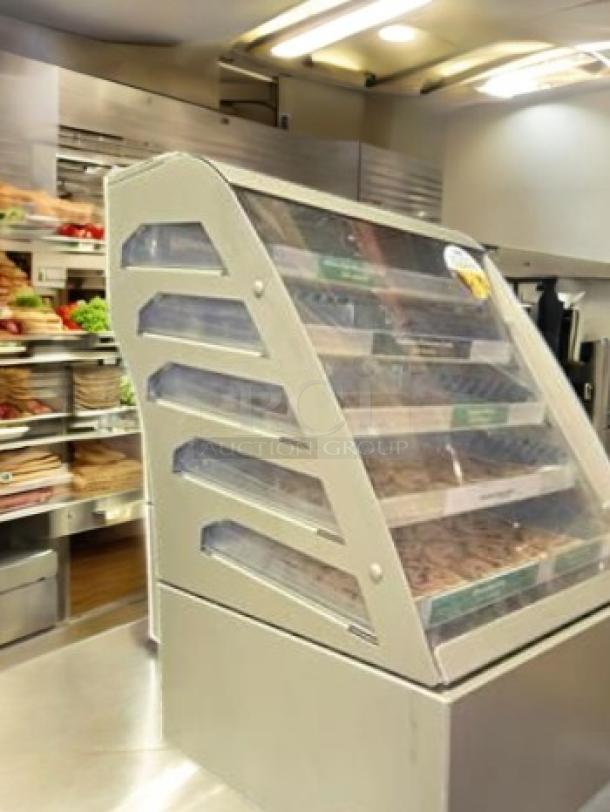 Commercial countertop bakery display case, 4-tier cookie merchandiser; superb condition, fully tested, and working.