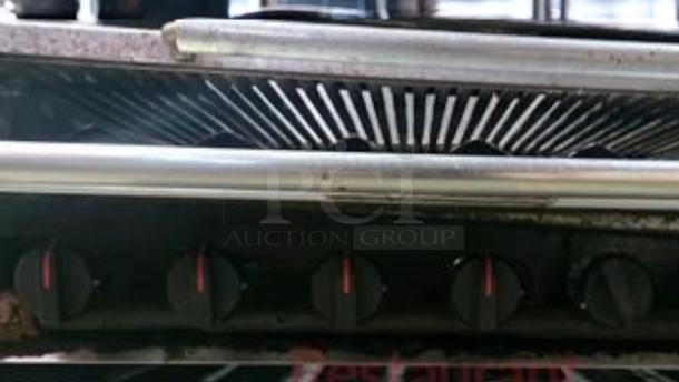 MagiKitch’n CM-RMB-636 36" radiant gas charbroiler. Features round grill rods, black knobs, outstanding condition, fully tested.