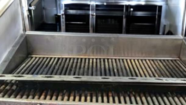 MagiKitch’n CM-RMB-636 radiant gas charbroiler with round grill rods, 36", outstanding condition, fully tested and working.