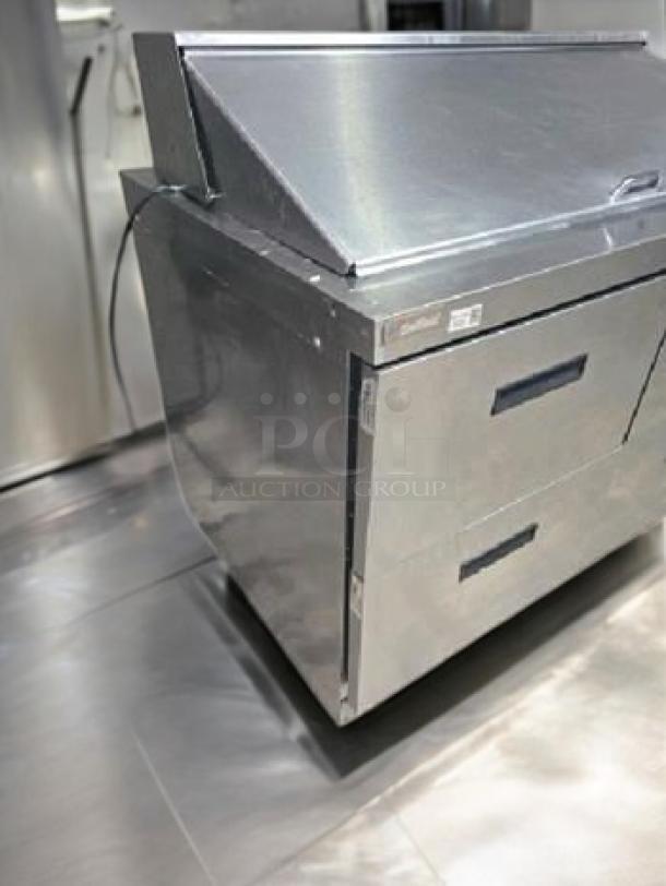 Delfield 4448N-18M 48" refrigerated sandwich/salad prep table. Two drawers, stainless steel, superb condition, fully tested.