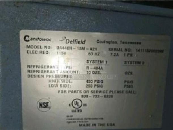Metal plate displaying details of a Delfield 4448N-18M sandwich/salad prep table. Includes model, refrigerant type, and electrical specs.