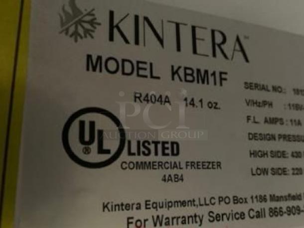 Label showing Kintera KBM1F commercial freezer details, including UL listing and serial information.