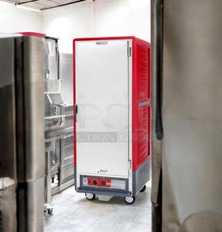 Metro C5 3-Series Heated Holding Cabinet, full height, excellent condition, red and white, on wheels, 120V, tested and working.