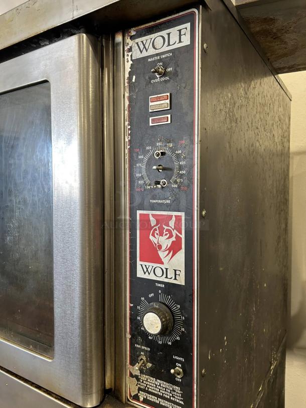 WOLF WKGD-2 Double Deck Gas Convection Oven, tested and working. Visible controls, timer, and temperature dials. Excellent condition.