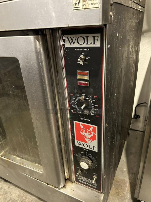 WOLF WKGD-2 double deck gas convection oven in excellent condition. Features control panel with temperature and timer dials.