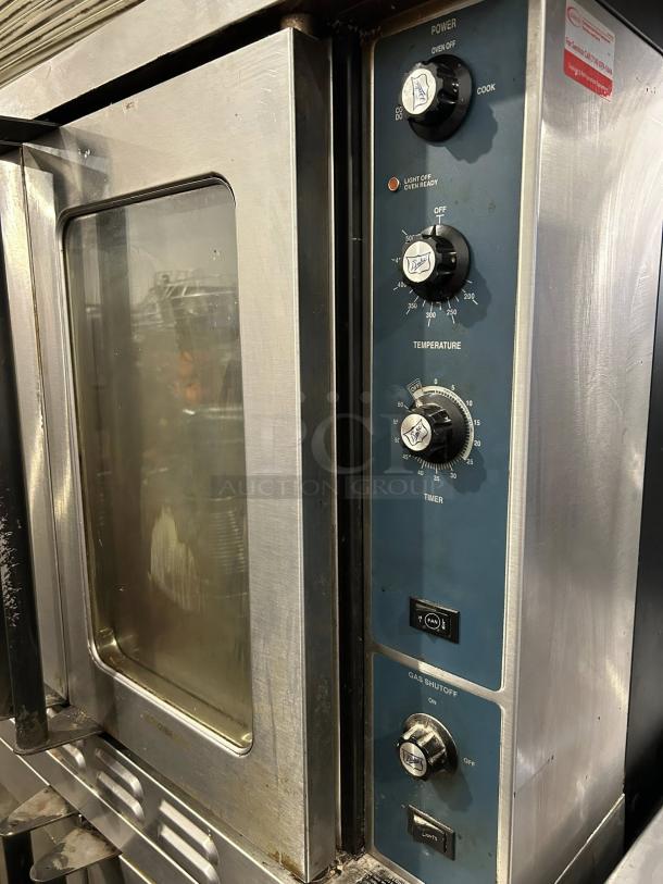 Duke E102-G double convection oven, natural gas, 40,000 BTU, tested, working, metallic finish, visible control panel.