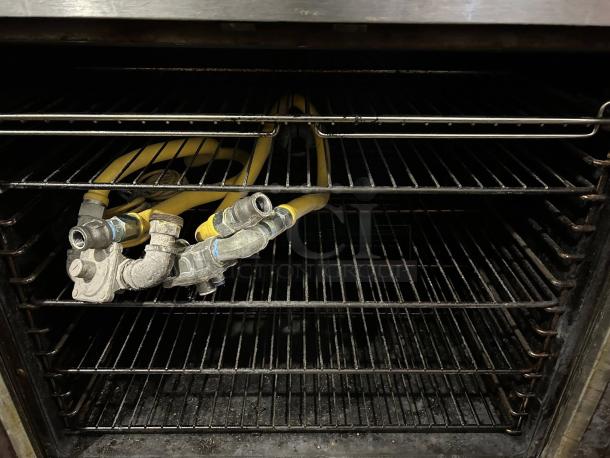 Duke E102-G double full-size natural gas convection oven, 40,000 BTU, tested and working, interior view with gas pipes.