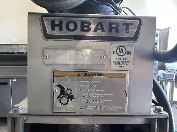 Hobart WPS1200 Waste System in excellent condition. Features 208v, 3-phase power. Includes warning labels and UL listed mark.
