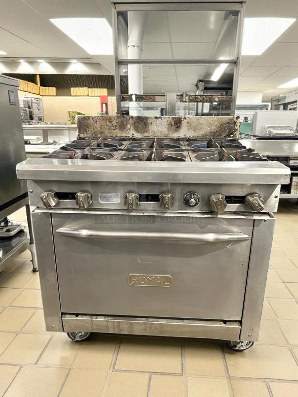 Royal Range RR-6 commercial gas range, 6 burners, 36" width, excellent condition, tested and working, stainless steel, logo visible.