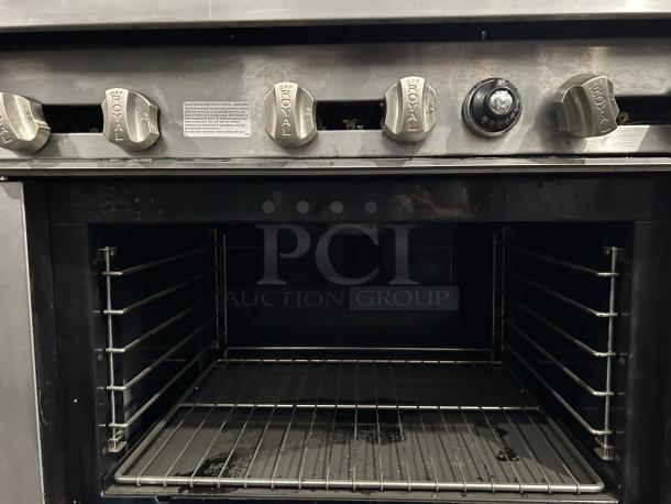 Royal Range RR-6 commercial 6-burner gas range, excellent condition. Stainless steel, tested, working, clear dial markings.