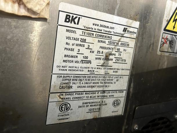 Alt text: "BKI ETE102R combination oven label showing model, voltage, and specifications. Excellent condition, tested and working."