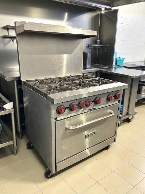 MoTak MR6-C-S 36" 6 burner gas range with standard oven, great condition, stainless steel, tested and working.