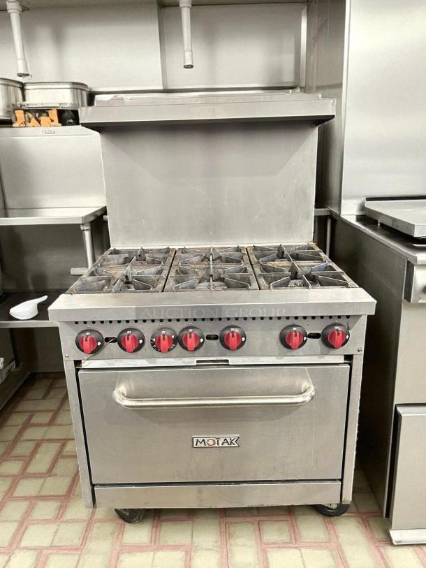 MoTak MR6-C-S 36" 6 Burner Gas Range with standard oven, great condition, tested and working, visible brand logo.