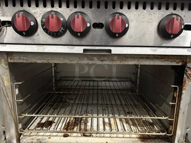 MoTak MR6-C-S 36" 6 Burner Gas Range with oven, featuring red control knobs and interior oven racks, tested and working.