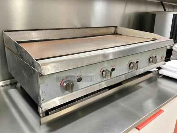 Cooking Performance Group GM-CPG-48-NL gas griddle, 48" wide, manual controls, 120,000 BTU, excellent condition, tested.