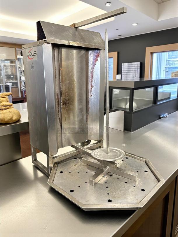 AXIS AX-VB3 18" 3 Burner Vertical Gas Broiler in great condition. Stainless steel, tested and working. Brand logo visible.