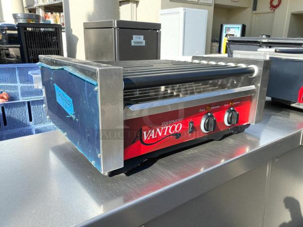 Avantco RG1830NS hot dog roller grill with 11 non-stick rollers, excellent condition, 120V, 910W, tested and working.