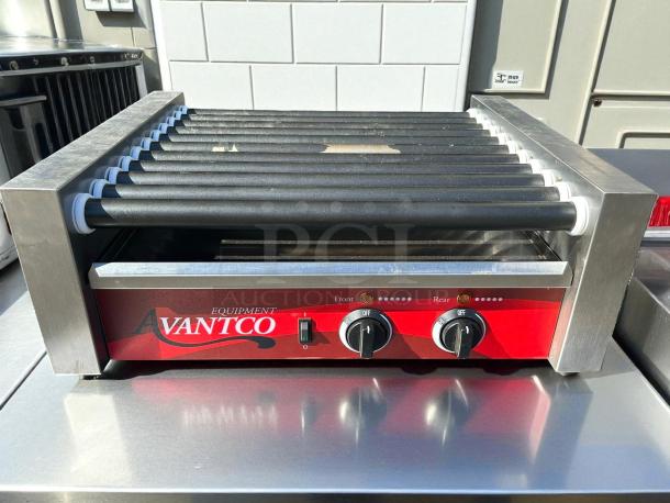 Avantco RG1830NS hot dog roller grill with 11 non-stick rollers; excellent condition, 120V, 910W, tested and working.