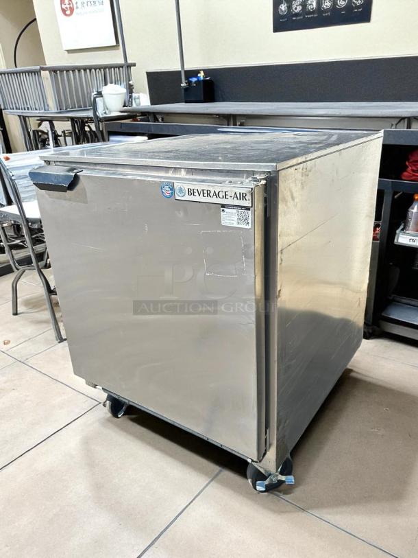 Beverage Air UCR27A undercounter refrigerator in excellent condition; tested and working. Features a compact 27" design.