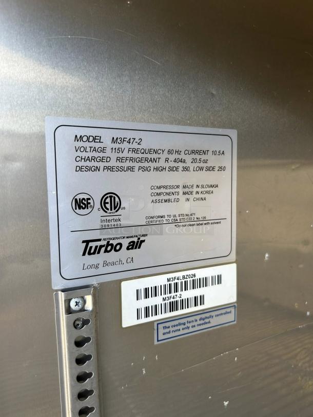 Turbo Air M3F47-2-N freezer label showing model info and specifications, including voltage, refrigerant, and pressure details.