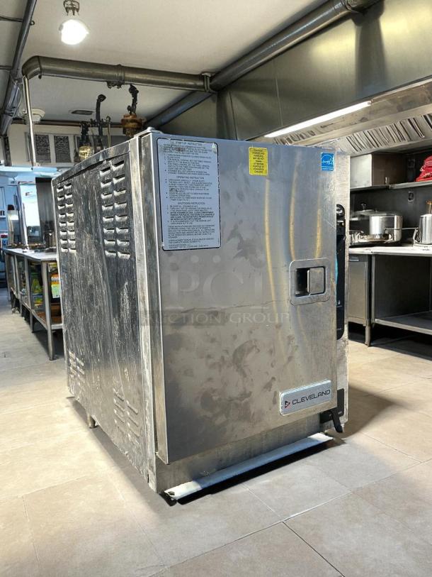 Cleveland 22CET3.1 SteamChef 3 Pan Electric Countertop Steamer, 208V, 3 Phase, 12 kW, tested and working, stainless steel, visible labels with operating instructions.