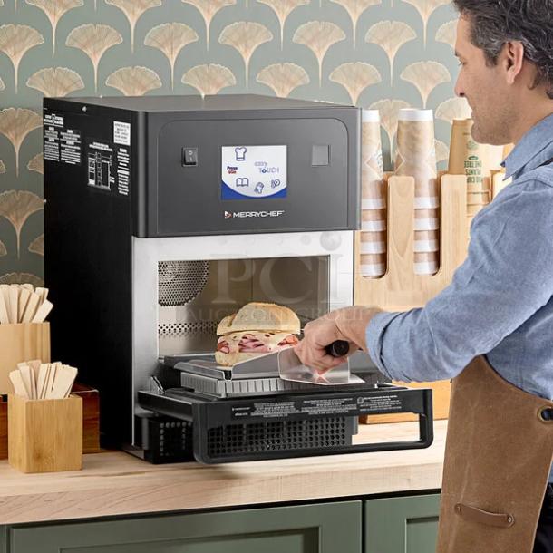 Brand new Merrychef eikon E4S high-speed countertop convection oven, 208/240v/1ph, with touch controls, in original packaging.