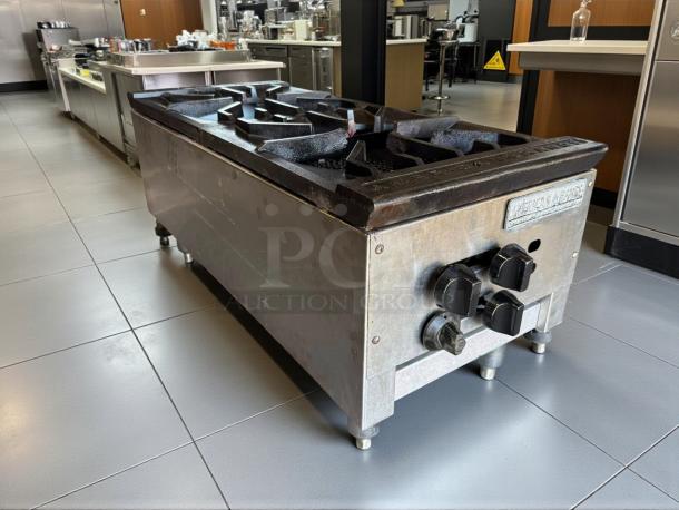 American Range ARSP-18-2 stock pot range, 18" wide, two 3-ring burners, tested, working, great condition, visible knobs, metal body.