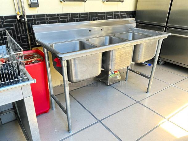 Advance Tabco T9-3-54 Regaline three-compartment stainless steel commercial sink, excellent condition, tested, and working.
