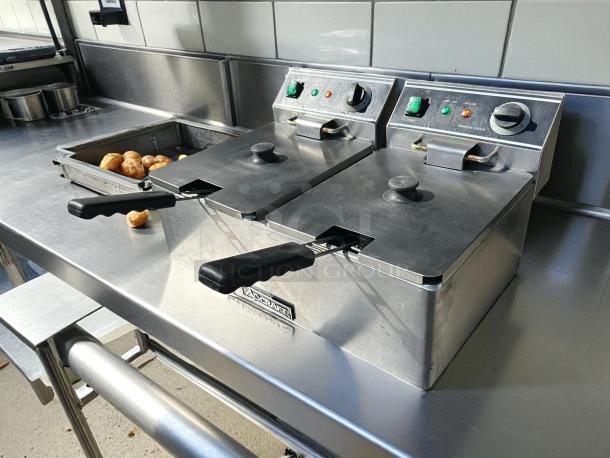 Adcraft DF-6L/2 double tank deep fryer in stainless steel, tested and working, with control knobs and handles visible.