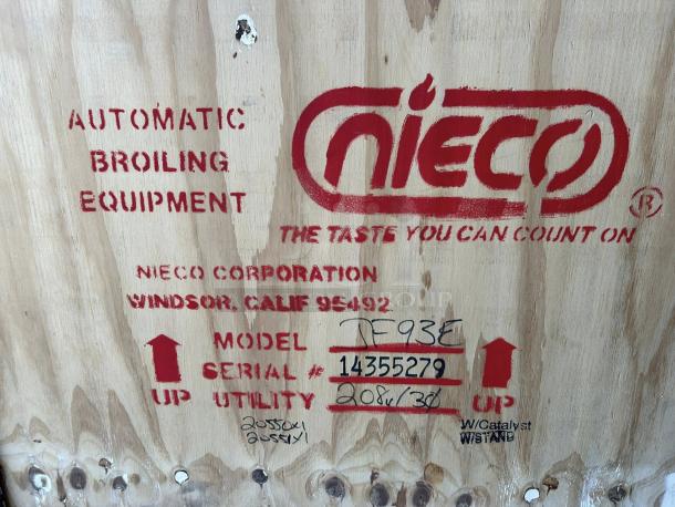 Nieco JF93E Electric Dual Belt Broiler crate with red stenciling, model and serial numbers, and utility specs. 