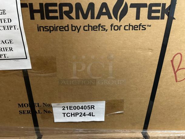 Brand new Therma-Tek TCHP24-4 gas hotplate in original packaging, labeled with model and serial numbers.