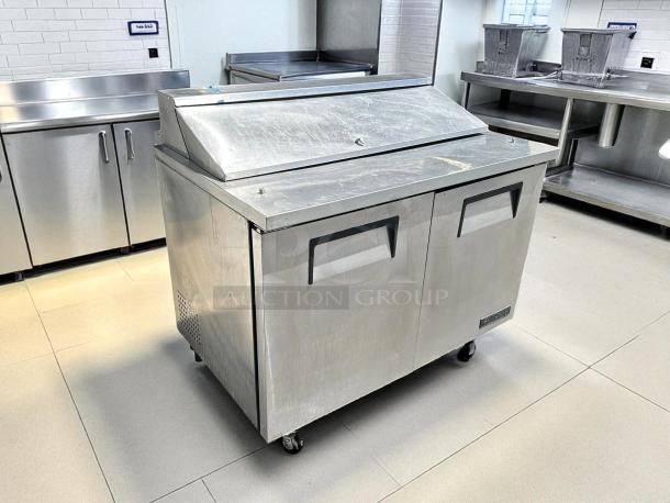 True TSSU-48-12-HC 2-door refrigerated sandwich prep table, 48 3/8", stainless steel, tested and working condition.