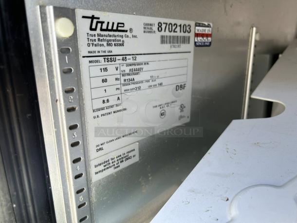 True TSSU-48-12-HC 2-door refrigerated sandwich prep table, tested and working. Visible label shows specs and NSF certification.