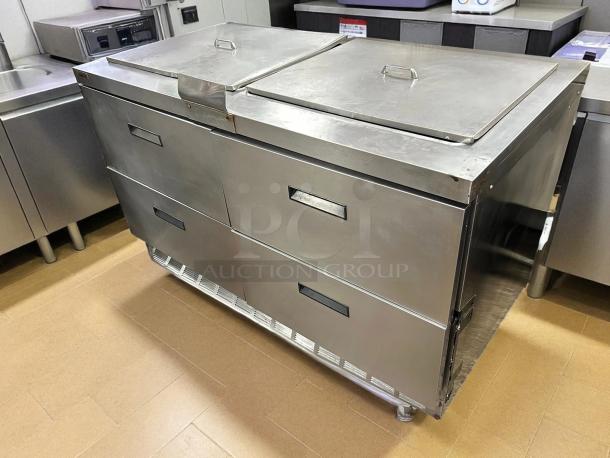 Delfield 4460NP-24M 60" mega top prep table with 2 doors, 24 pans, excellent condition, stainless steel finish.