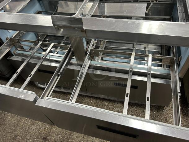 Delfield 4460NP-24M 60" mega top prep table, excellent condition, stainless steel with 24 pan slots, tested and working.