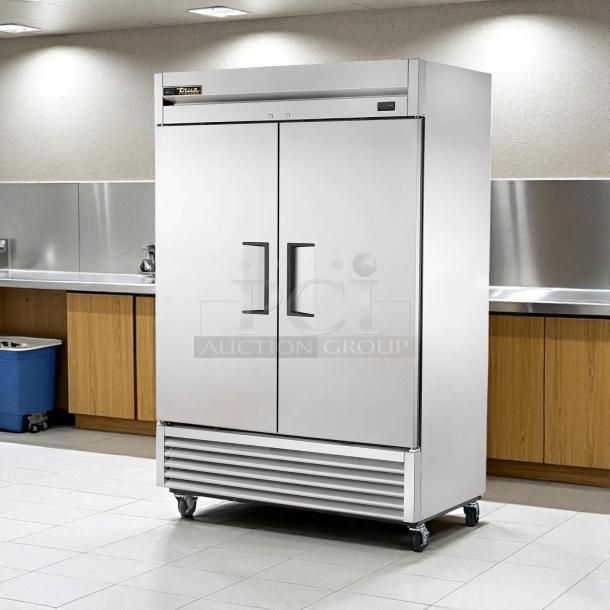 True T-49-HC Refrigerator, 54 1/8" solid doors, stainless steel, tested and working, on wheels, pristine condition.