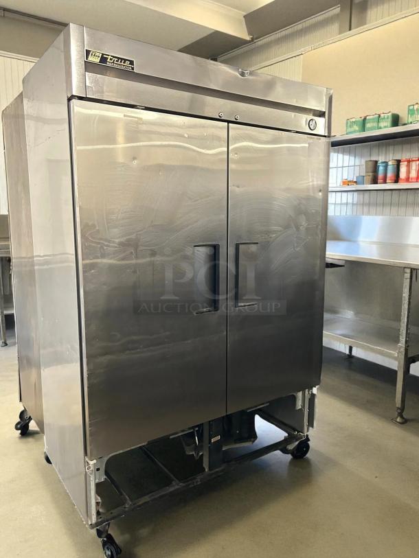 True T-49-HC solid door reach-in refrigerator, 54 1/8", stainless steel, tested and working, logo label on top.