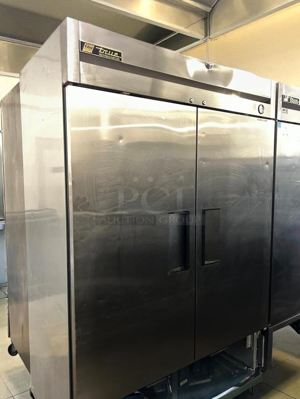 True T-49-HC solid door reach-in refrigerator, stainless steel, tested and working, 54 1/8", True branding visible.