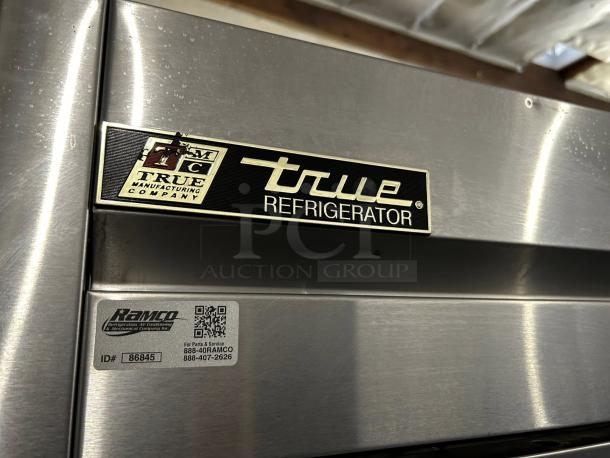 True T-49-HC reach-in refrigerator, stainless steel, solid doors, tested and working, Ramco service tag visible.