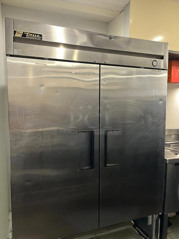 True T-49-HC solid door reach-in refrigerator, 54 1/8", excellent condition, tested, stainless steel, visible brand logo.