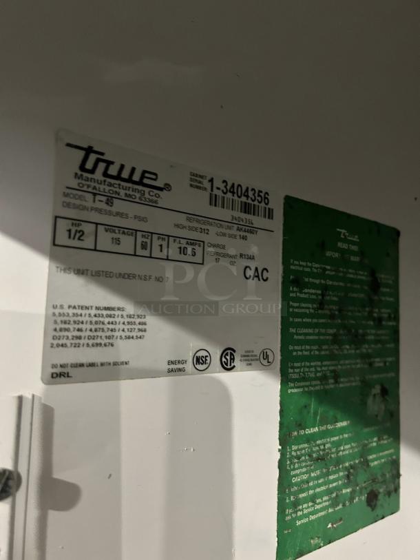 True T-49-HC refrigerator label. Shows model, serial number, energy-saving note, and NSF, UL certifications.